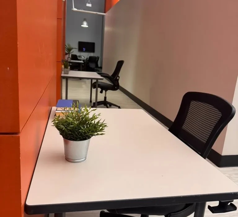 Dedicated desk in the open coworking space at World Park Alpharetta