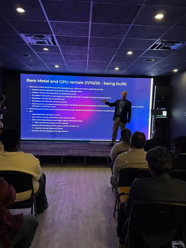 Speaker presenting MarQi Cloud bare metal and GPU cloud services at World Park