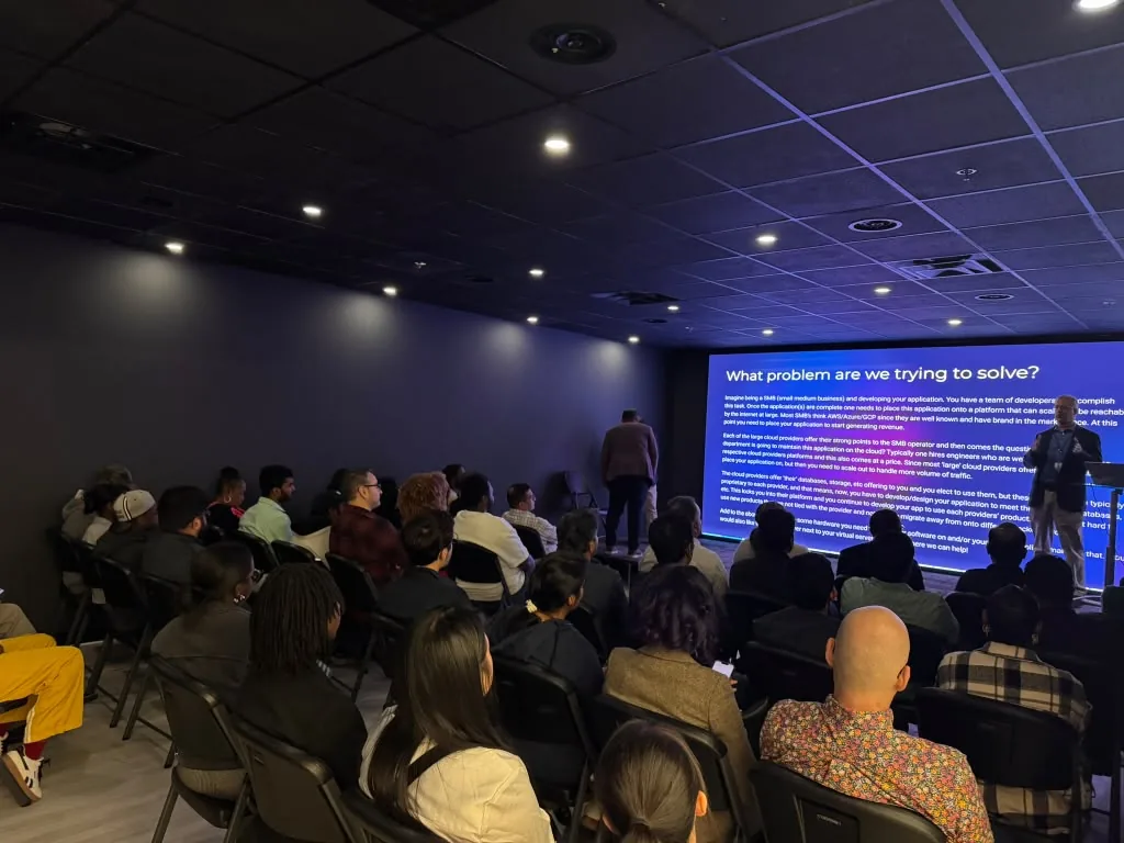 Full audience at the MarQi Cloud tech talk in the World Park theater room