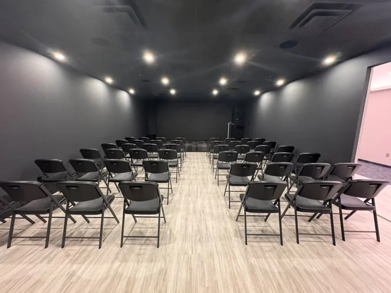 Universe Training Room with theater seating for 60 and stage at World Park